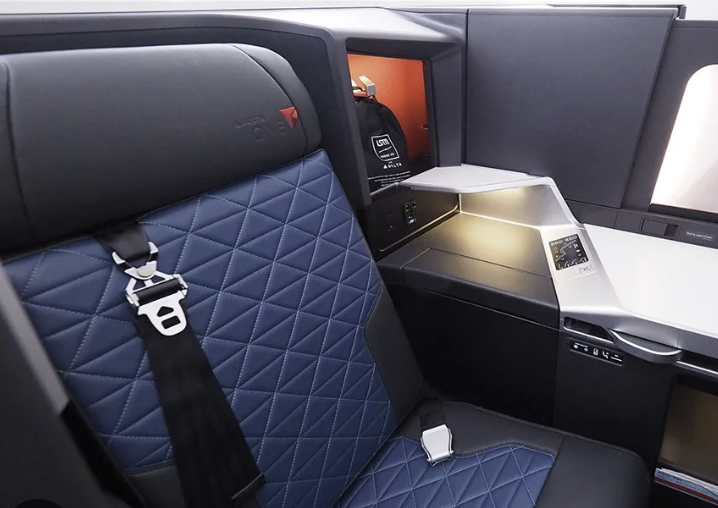 Close-up of blue quilted leather on a Delta One seat